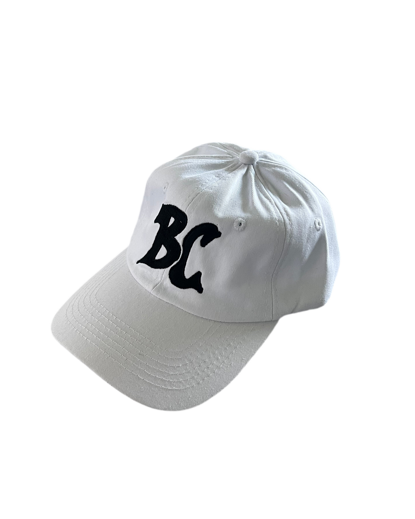 White cap with black 'BC' logo on a white background